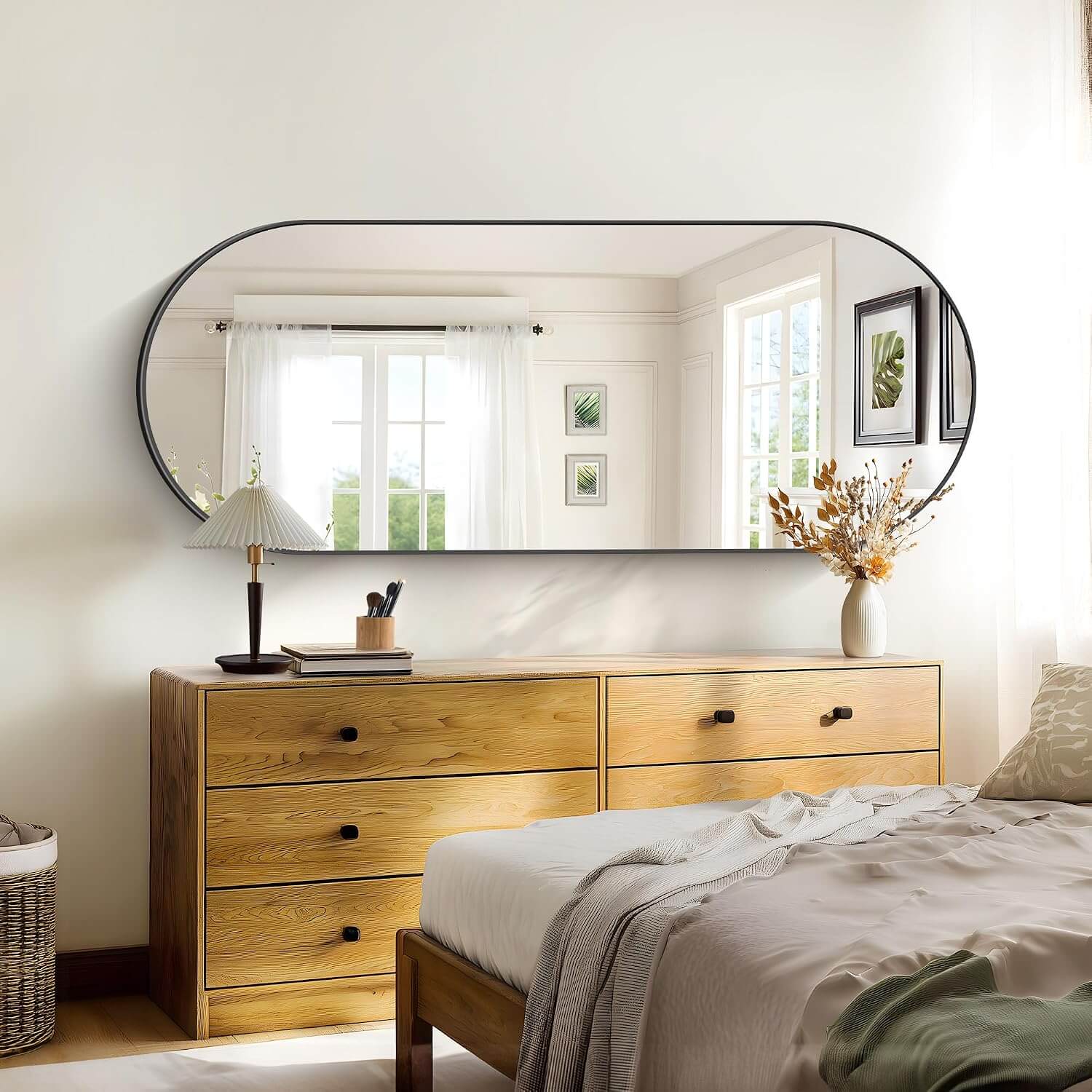 Sleek Black Oval Wall Mirror - 24" x 60" Modern Metal Frame for Bathroom, Bedroom, and Entryway